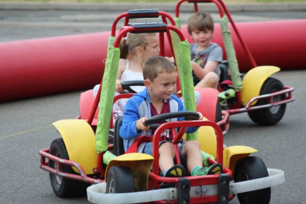 children boy girl go karts